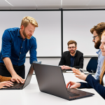 **Image:** A diverse group of Dutch professionals collaborating in a modern office, participating in a workshop. Focus on teamwork, communication, and lifelong learning, with laptops and online learning platforms visible in the background. The atmosphere should be collaborative and forward-thinking.